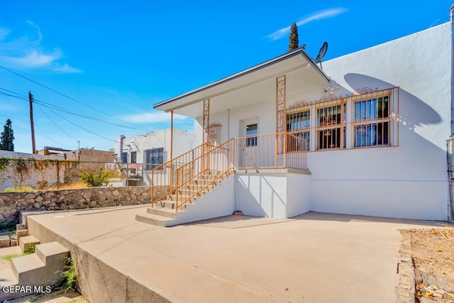 exterior space with a patio