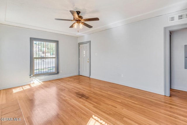 unfurnished room featuring ceiling fan and light wood-type flooring