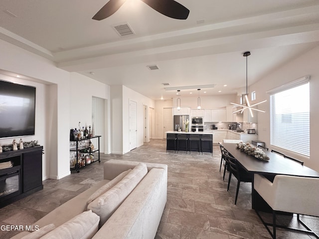 living room with ceiling fan