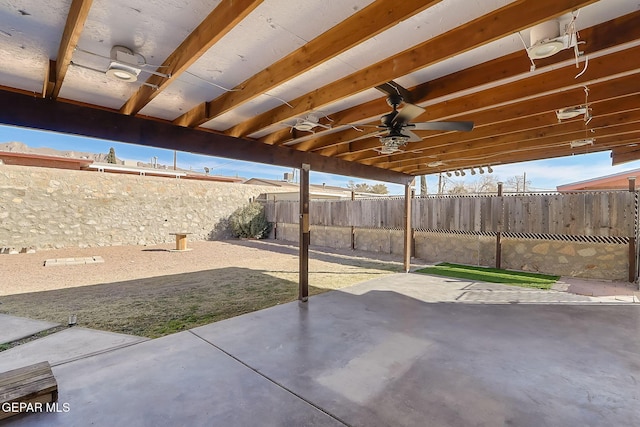 view of patio featuring ceiling fan