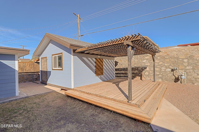 wooden terrace featuring a pergola