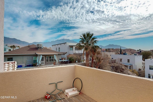 balcony featuring a mountain view