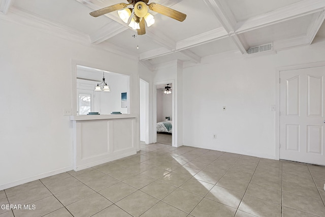 tiled spare room with ornamental molding, coffered ceiling, and beam ceiling