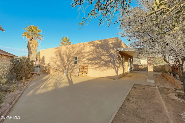 view of front of home with a patio