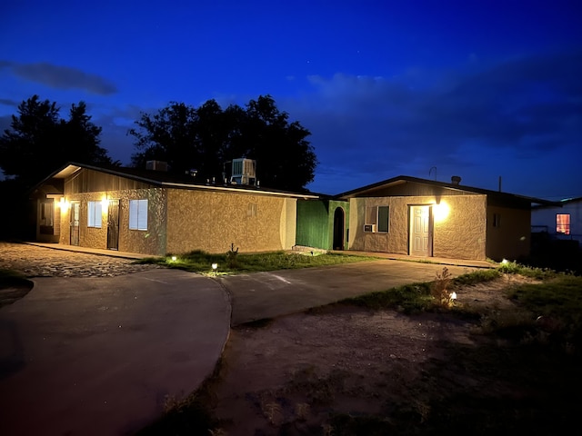 view of front of house with central AC unit