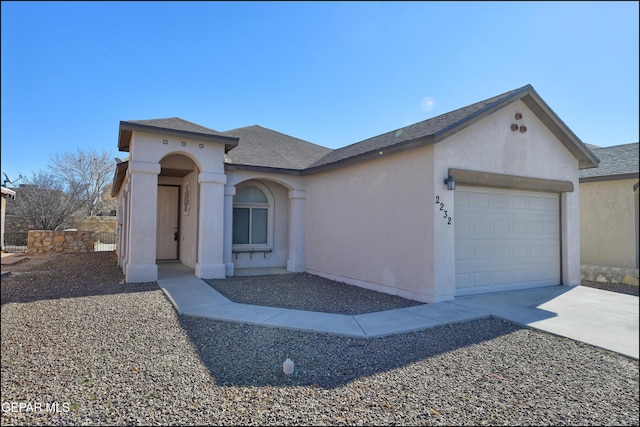 view of front of property featuring a garage