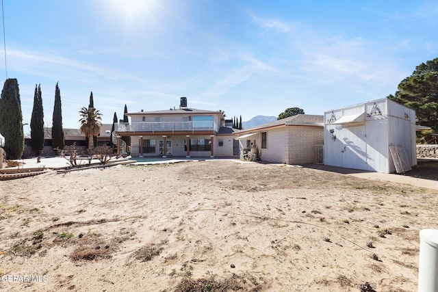 back of property featuring a patio