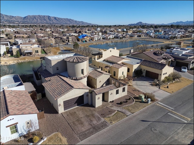 aerial view with a water and mountain view