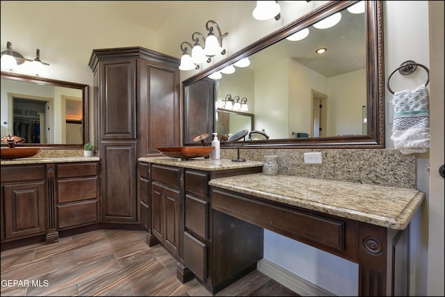 bathroom featuring vanity