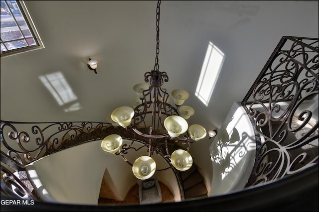 details with an inviting chandelier