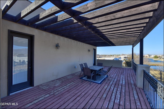 wooden deck with a pergola