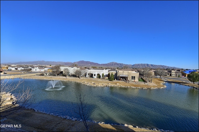 property view of water featuring a mountain view