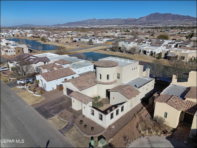 drone / aerial view featuring a mountain view