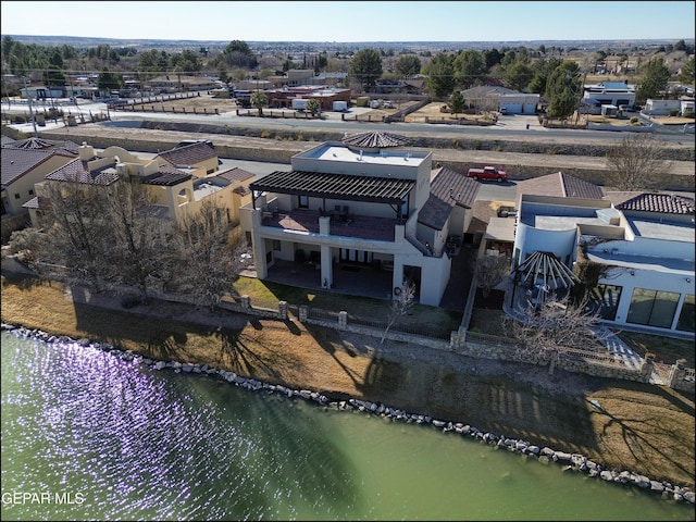 drone / aerial view featuring a water view