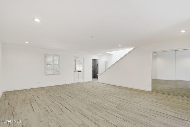 empty room with light wood-type flooring