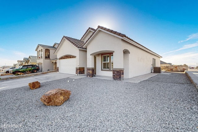 view of front of home featuring central AC unit