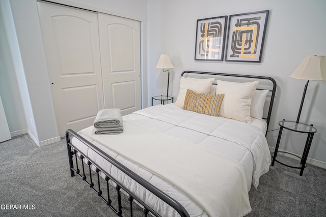 bedroom featuring a closet and carpet flooring