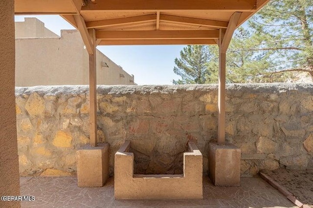 exterior space featuring a wood stove