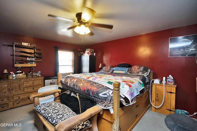 bedroom with ceiling fan and light colored carpet