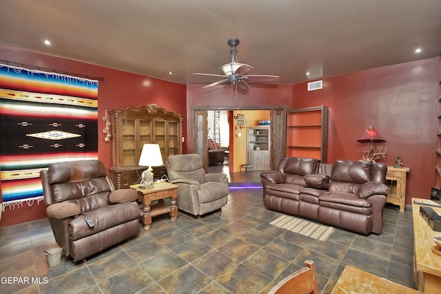 living room featuring ceiling fan