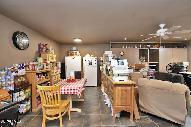 tiled dining area featuring ceiling fan