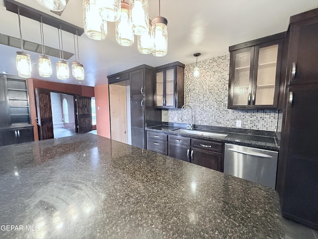 8204 Big Bend Dr, El Paso, TX 79904 - kitchen featuring stainless steel dishwasher, a chandelier, dark brown cabinets, and tasteful backsplash