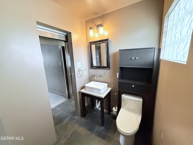 8204 Big Bend Dr, El Paso, TX 79904 - bathroom featuring toilet and tile patterned floors