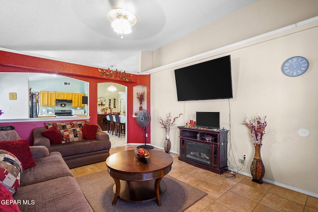 living room with light tile patterned floors