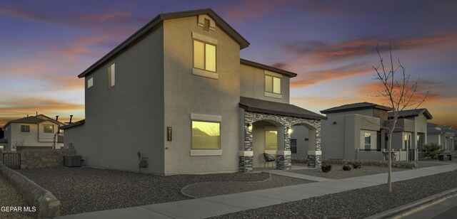 view of front of house featuring central AC unit