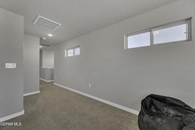 basement featuring carpet flooring