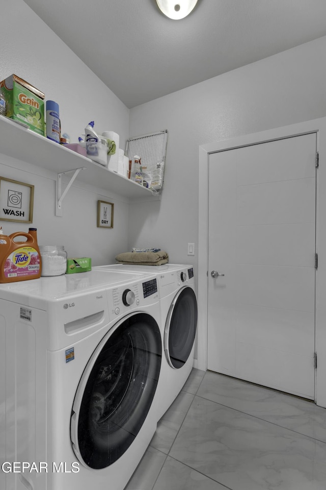 washroom featuring separate washer and dryer