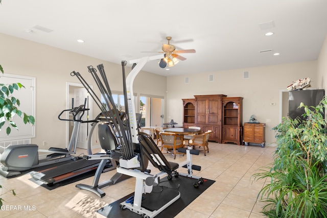 workout area with light tile patterned flooring and ceiling fan