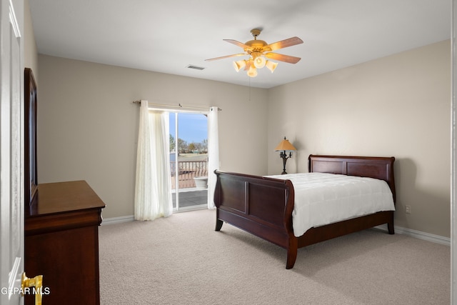 carpeted bedroom with access to exterior and ceiling fan