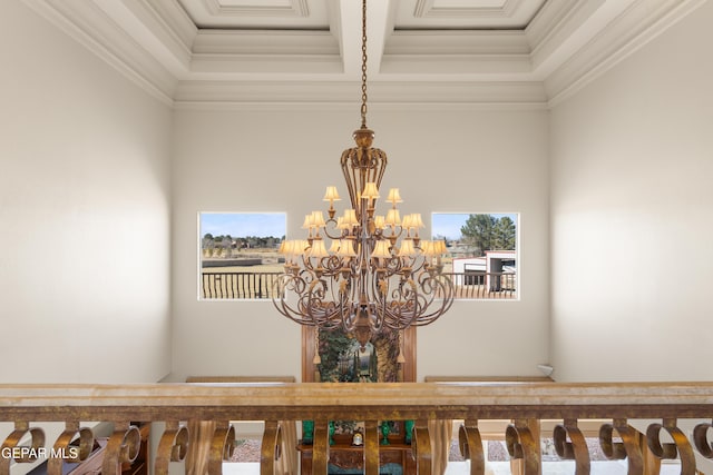 details featuring ornamental molding and a notable chandelier