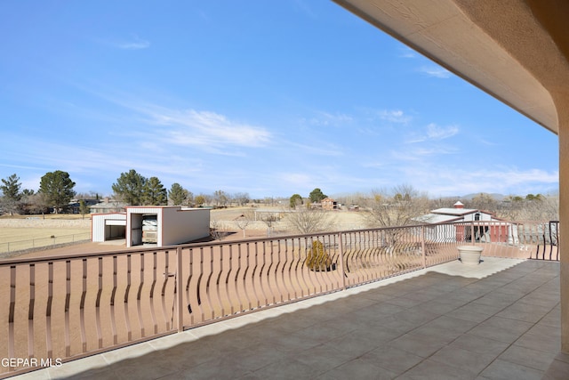 view of patio with a balcony