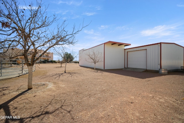 view of outdoor structure with a garage