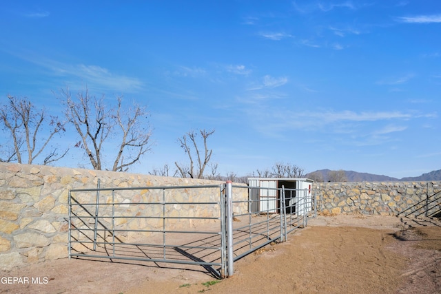 exterior space with an outdoor structure and a mountain view