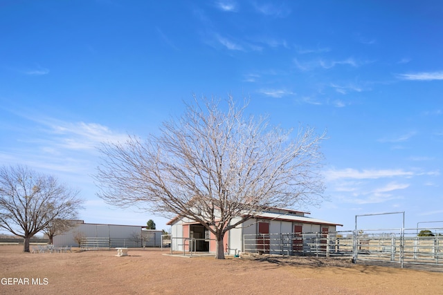 exterior space featuring an outbuilding