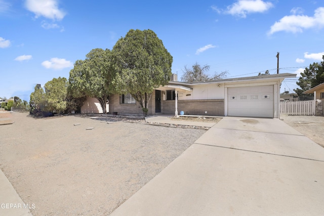 single story home with a garage