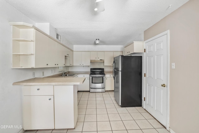 kitchen featuring light tile patterned flooring, sink, a textured ceiling, kitchen peninsula, and stainless steel appliances