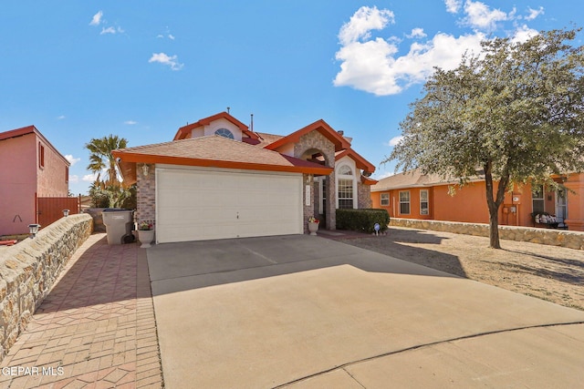 ranch-style home with a garage