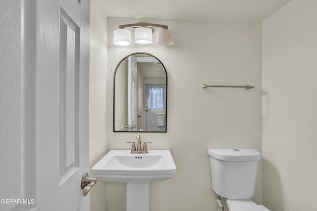 bathroom featuring toilet