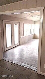 interior space featuring brick floor