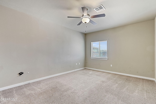 unfurnished room with light carpet and ceiling fan