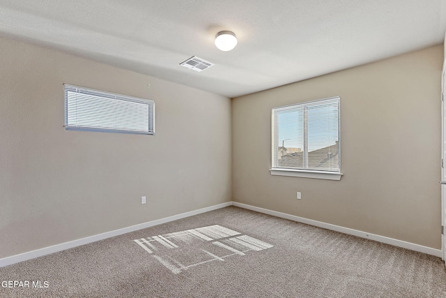 view of carpeted spare room