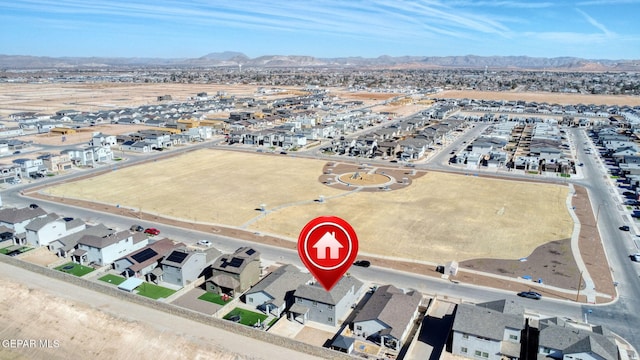 drone / aerial view featuring a mountain view