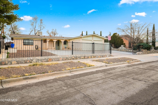 single story home with a garage