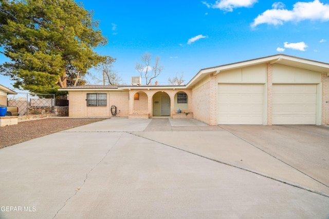 single story home with a garage