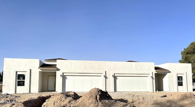 view of pueblo revival-style home