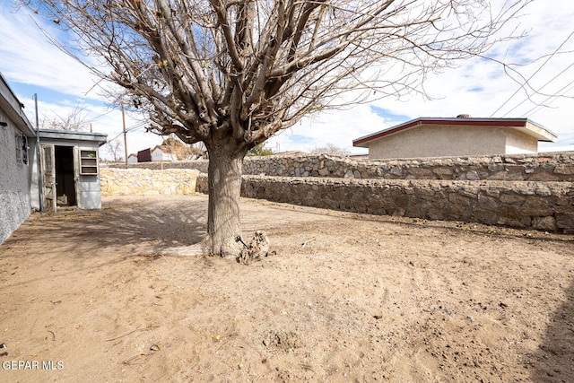 view of yard with fence